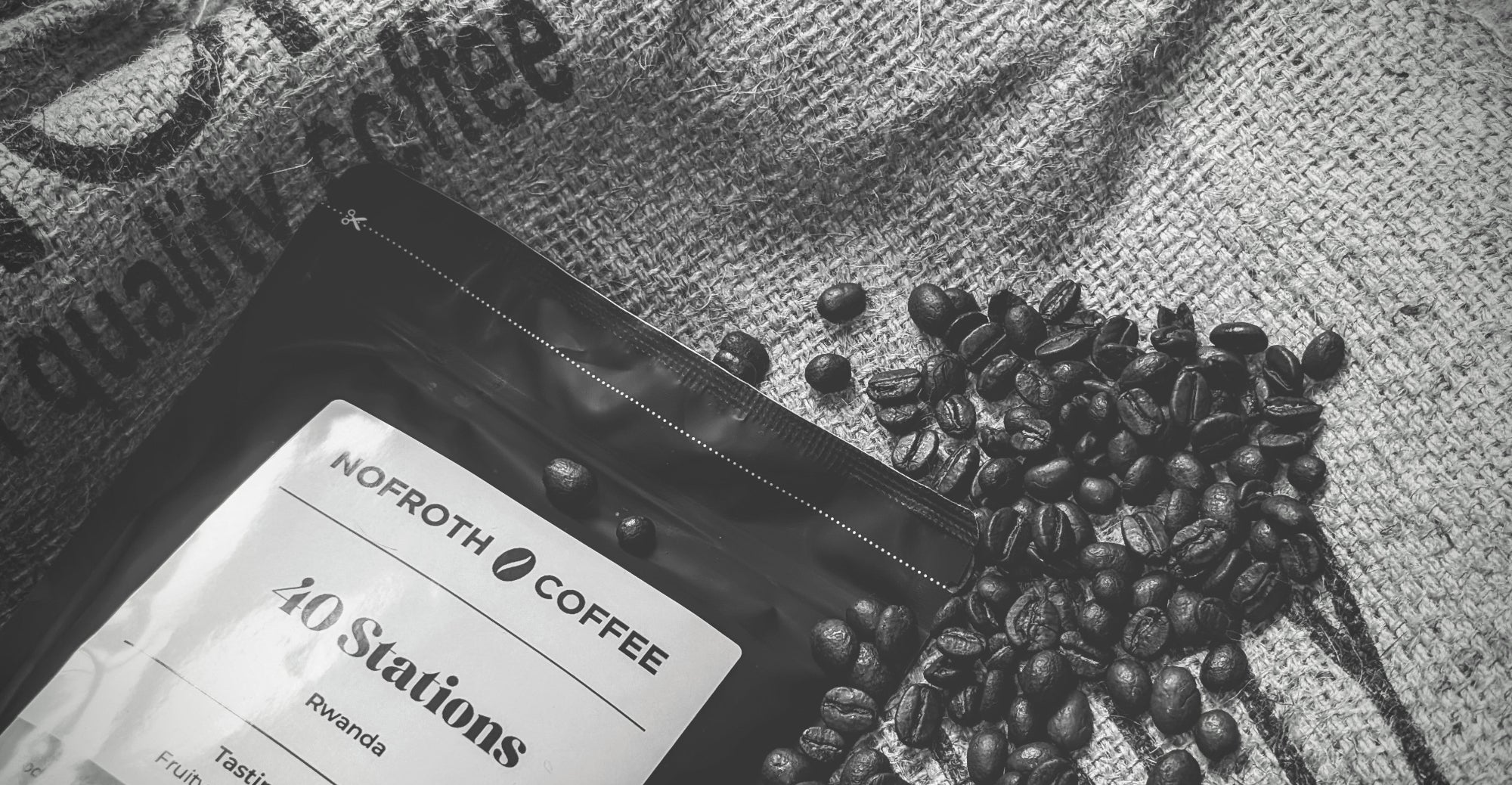 Nofroth Coffee packaging with coffee beans on a textured fabric background